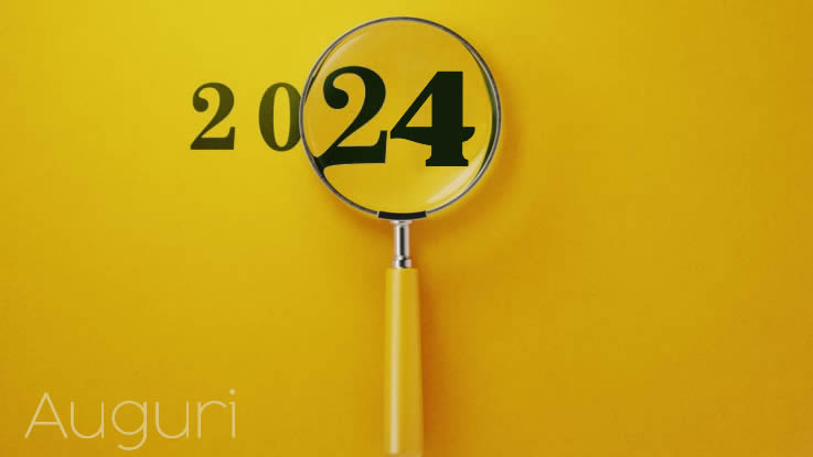 Immagine a sfondo giallo con scritta 2025 con lente di ingrandimento. Bella e originale.